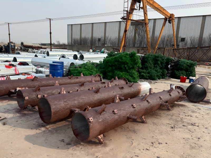 Camouflaged Pine Tree Monopole Installing Synthetic Bark